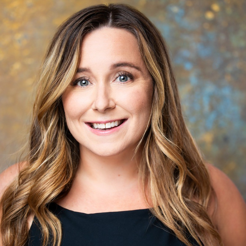 Katina Sawyer (Ph.D.), Co-Founder of Workr Beeing seen with beautiful long golden color hair style